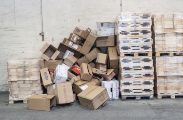 pile of cardboard against wall