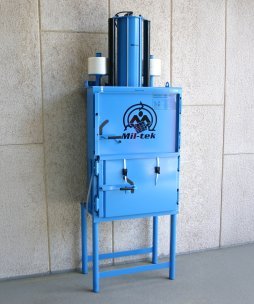 Blue Mil-tek 102 baler standing on the floor (used)