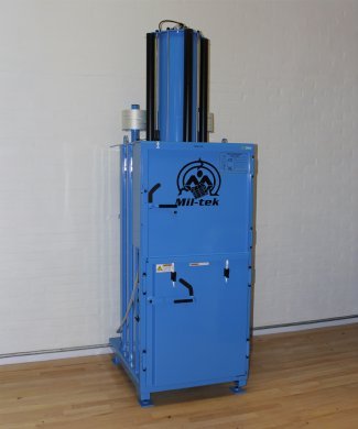 blue refurbished baler against wall